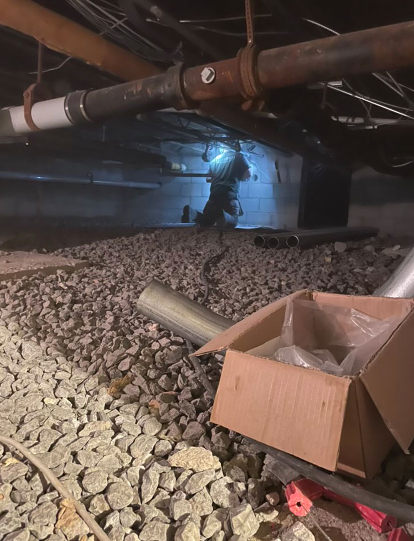 drilling underground through a concrete wall