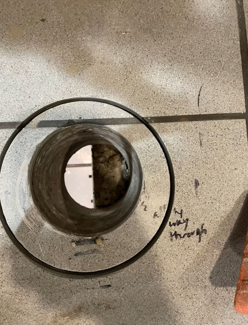 drain hole made by drilling through concrete
