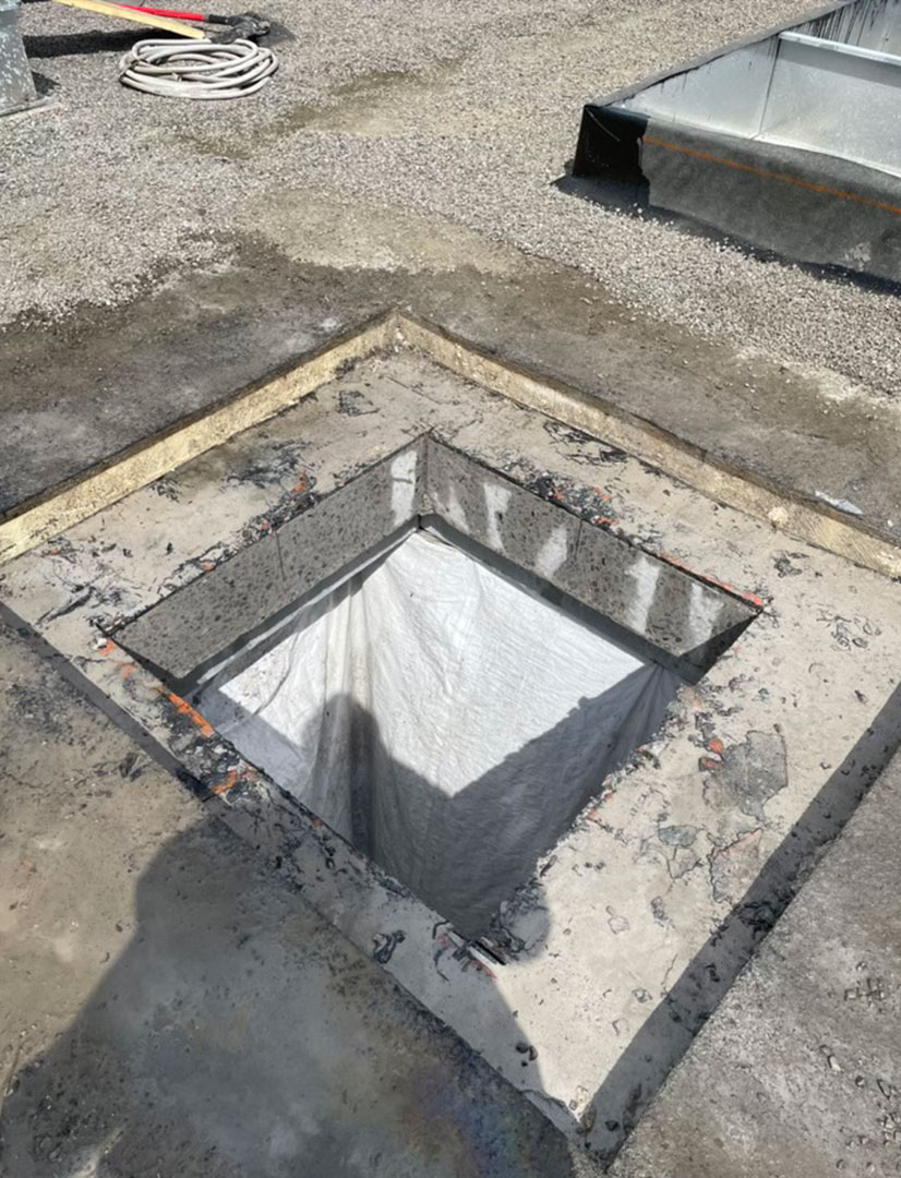 hole cut through roof using slab saw