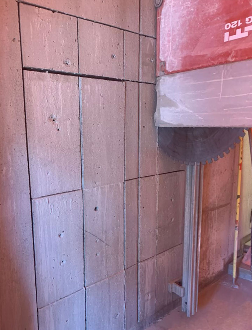 wall saw cutting a door through concrete